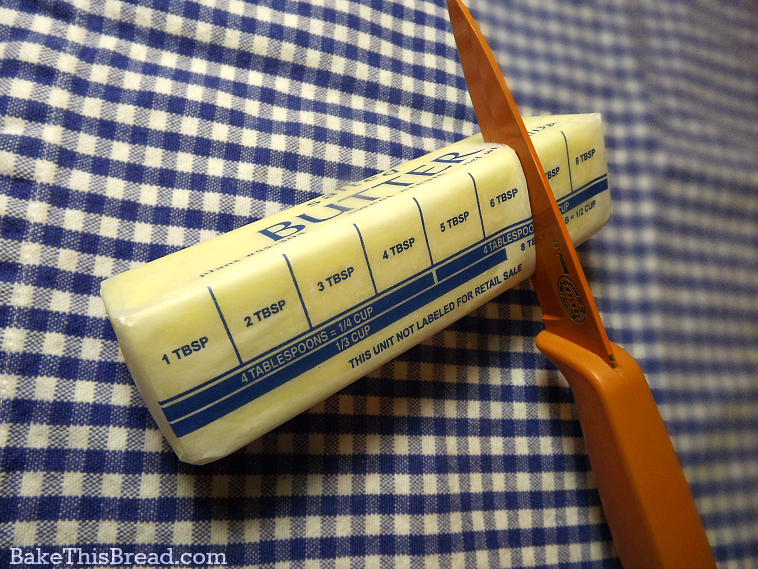 butter measured for homemade yeasted cinnamon bread by bake this bread